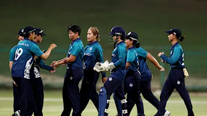 Players of Thailand celebrate taking the wicket of Gettika Kodali of USA