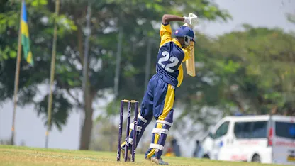 120826 Sierra Leone Vs Mozambique-Carlos Sergio of Mozambique drives one through the covers