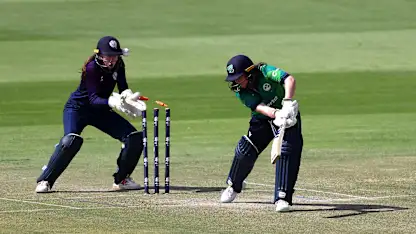 Laura Delaney of Ireland is bowled out by Kathryn Bryce of Scotland during the ICC Women's T20 World Cup Qualifier 2024 Semi-Final match between Ireland and Scotland at Zayed Cricket Stadium on May 05, 2024 in Abu Dhabi, United Arab Emirates.