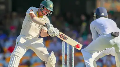 Logo of Head top scored for Australia in Brisbane with a 187-ball 84