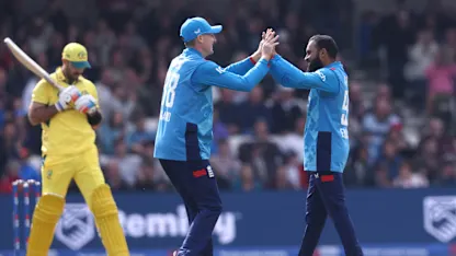 Logo of Harry Brook and Adil Rashid celebrate the wicket of Glenn Maxwell