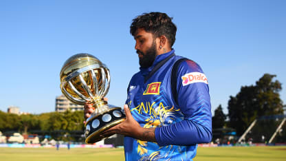 Wanindu Hasaranga of Sri Lanka celebrates with the ICC Men´s Cricket World Cup Qualifier Trophy after defeating Netherlands during the ICC Men´s Cricket World Cup Qualifier