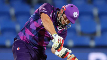 Scotland's George Munsey (L) plays a shot watched by Zimbabwe's wicketkeeper Regis Chakabva during the ICC mens Twenty20 World Cup 2022