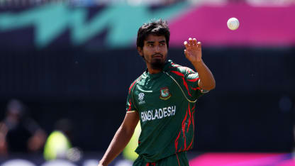 Tanzim Hasan Sakib of Bangladesh gathers the ball during the ICC Men's T20 Cricket World Cup West Indies & USA 2024 match between South Africa and Bangladesh at Nassau County International Cricket Stadium on June 10, 2024 in New York, New York.