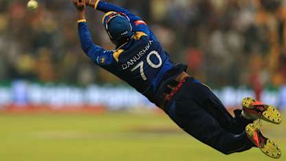 Gunathilaka dives for a catch