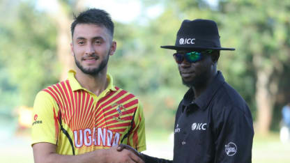 Player of the match Riazat Ali Shah receives his award from Nigerian umpire Kehinde Olanbiwonnu  (1)