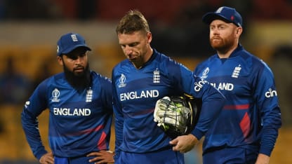 Adil Rashid, Jonny Bairstow and Jos Buttler of England cut dejected figures following the ICC Men's Cricket World Cup India 2023 between England and Sri Lanka