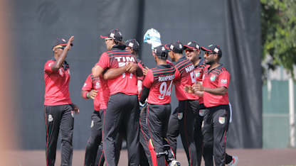Singapore celebrate the win against Scotland.