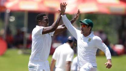 Lungi Ngidi and Dean Elgar celebrate the dismissal of Hardik Pandya