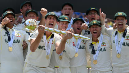 Pat Cummins of Australia lifts the ICC World Test Championship Mace on day five of the ICC World Test Championship Final between Australia and India