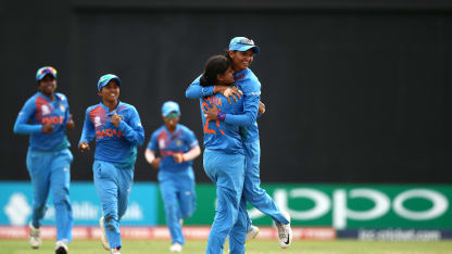 Radha Yadav of India celebrates a wicket with captain Harmanpreet Kaur during the ICC Women's World T20 2018 match between India and Australia at Guyana National Stadium on November 17, 2018 in Providence, Guyana.