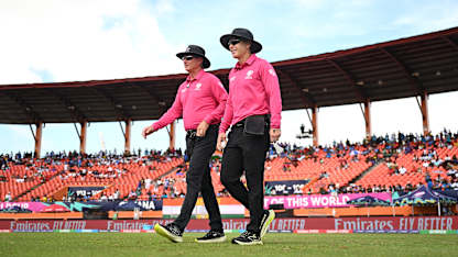 Umpires Chris Gaffaney (R) and Rod Tucker walk out on to the field during the ICC Men's T20 Cricket World Cup West Indies & USA 2024 Semi-Final match between India and England at Providence Stadium on June 27, 2024 in Georgetown, Guyana.
