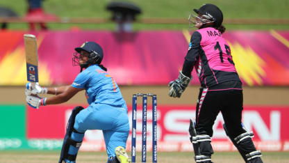 Harmanpreet Kaur of India sweeps as Katey Martin of New Zealand looks on during match 1 of the ICC Women's World T20 match between New Zealand v India on November 9, 2018 at the National Stadium in Providence, Guyana.
