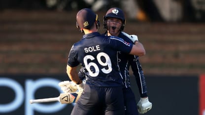 Chris Sole and Michael Leask of Scotland celebrate following the ICC Men's Cricket World Cup Qualifier Zimbabwe 2023 match between Ireland and Scotland