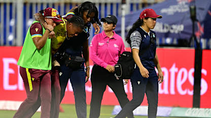 Chinelle Henry being assessed after ball strikes her in the face