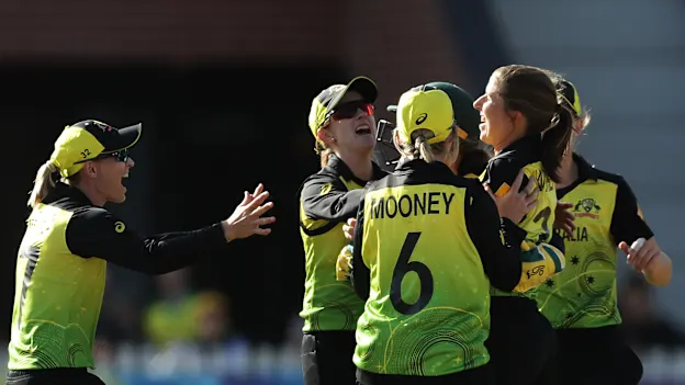 Georgia Wareham of Australia celebrates with team mates after taking the wicket of Sophie Devine of New Zealand during the ICC Women's T20 Cricket World Cup match between Australia and New Zealand at Junction Oval on March 02, 2020.