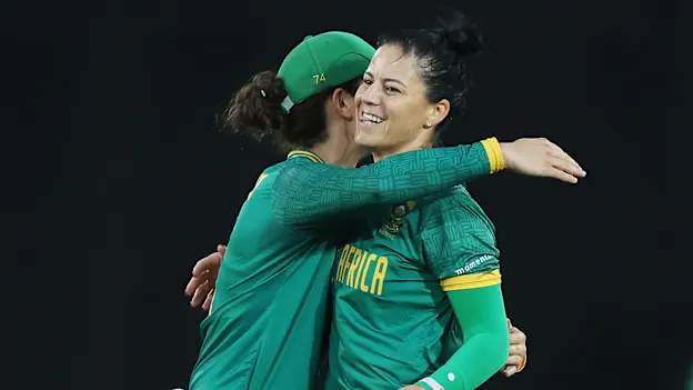 Marizanne Kapp of South Africa celebrates with Laura Wolvaardt of South Africa 