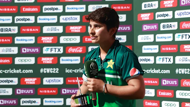 Nida Dar of Pakistan holds the Player of the Day award during the 2022 ICC Women's Cricket World Cup match between West Indies and Pakistan at Seddon Park on March 21, 2022 in Hamilton, New Zealand.