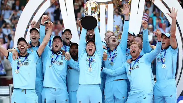 England captain Eoin Morgan lifts the ICC World Cup trophy during the Final of the ICC Cricket World Cup 2019 between New Zealand and England