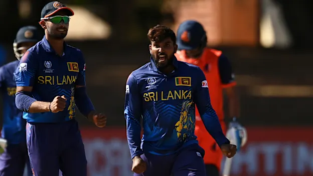 Wanindu Hasaranga of Sri Lanka celebrates the wicket of Teja Nidamanuru of Netherlands during the ICC Men's Cricket World Cup Qualifier