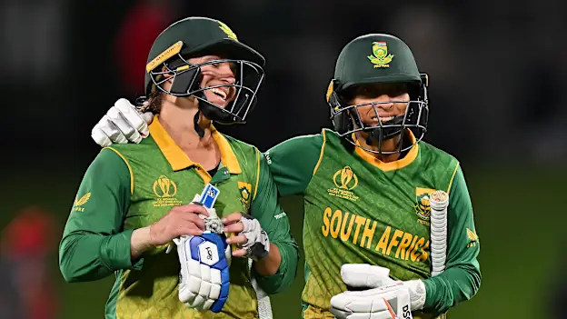 Shabnim Ismail and Mignon Du Preez of South Africa celebrate their victory during the 2022 ICC Women's Cricket World Cup match between India and South Africa at Hagley Oval on March 27, 2022 in Christchurch, New Zealand.