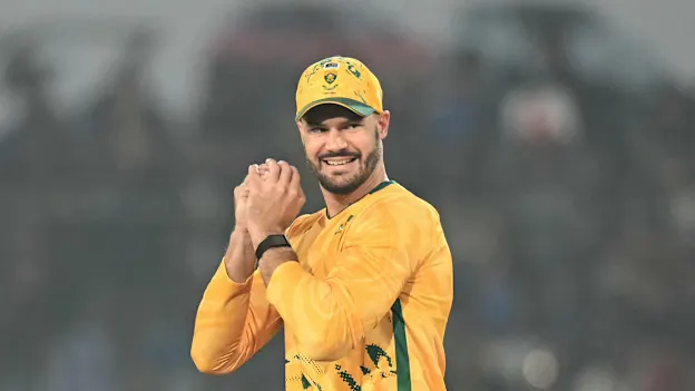 South Africa's captain Aiden Markram takes a catch to dismiss his Indian counterpart Suryakumar Yadav