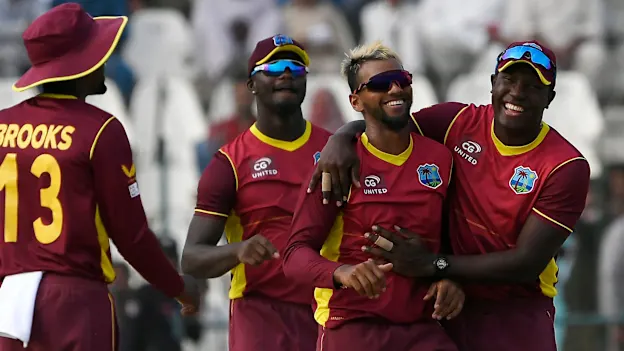 Nicholas Pooran celebrates a wicket