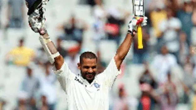 43722 Dhawan slams record Test hundred