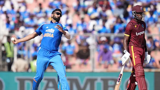 Naman Dhir of India bowls during the 1st ODI match between India and West Indies at the Sports Hub International Cricket Stadium, Thiruvananthapuram India on September 27, 2026