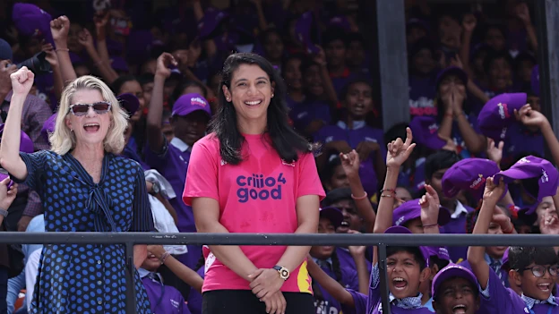 India vice-captain Smriti Mandhana teaches the first Criiio 4 Good learning modules to 1000 children at Narendra Modi Stadium.