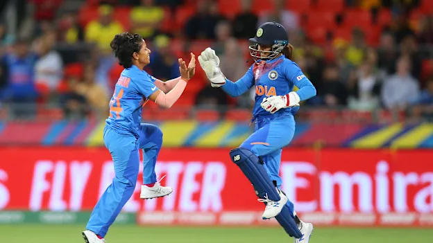 Poonam Yadav of India celebrates with Taniya Bhatia of India after dismissing Ellyse Perry of Australia during the ICC Women's T20 Cricket World Cup match between Australia and India at Sydney Showground Stadium on February 21, 2020 in Sydney, Australia.