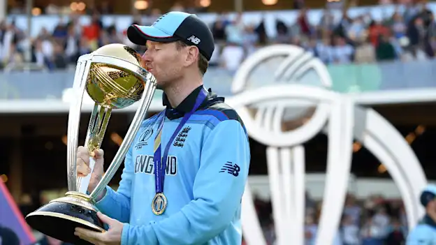Eoin Morgan of England lifts the Cricket World Cup Trophy