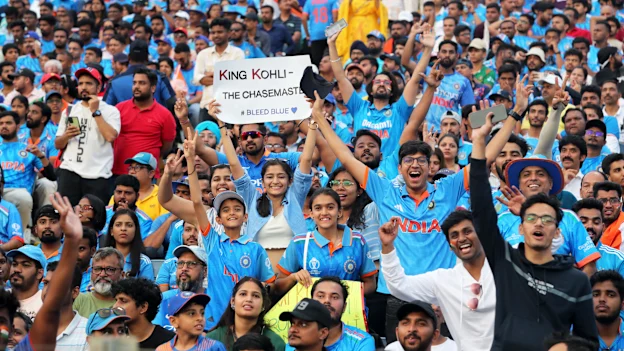 Spectators react in the crowd during the ICC Men's Cricket World Cup India 2023 between India and Bangladesh at MCA International Stadium on October 19, 2023 in Pune, India.