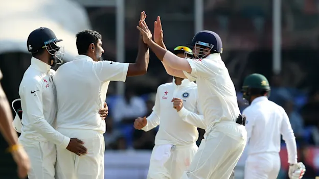 Ravichandran Ashwin celebrates wicket of Mominul Haque.jpg