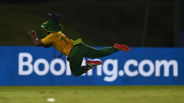 Temba Bavuma of South Africa catches out Mohammad Hafeez of Pakistan during the Pakistan and South Africa warm Up Match prior to the ICC Men's T20 World Cup at on October 20, 2021 in Abu Dhabi, United Arab Emirates.