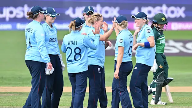Katherine Brunt of England celebrates with team mates