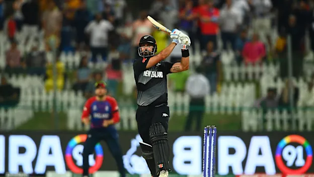 Daryl Mitchell of New Zealand plays a shot during the ICC Men's T20 World Cup semi-final match between England and New Zealand at Sheikh Zayed stadium on November 10, 2021 in Abu Dhabi, United Arab Emirates.