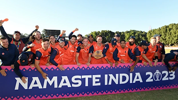 Players and Staff of Netherlands celebrate after beating Scotland to qualify for the World Cup following the ICC Men's Cricket World Cup Qualifier Zimbabwe 2023 Super 6 match between Scotland and Netherlands at Queen’s Sports Club on July 06, 2023.