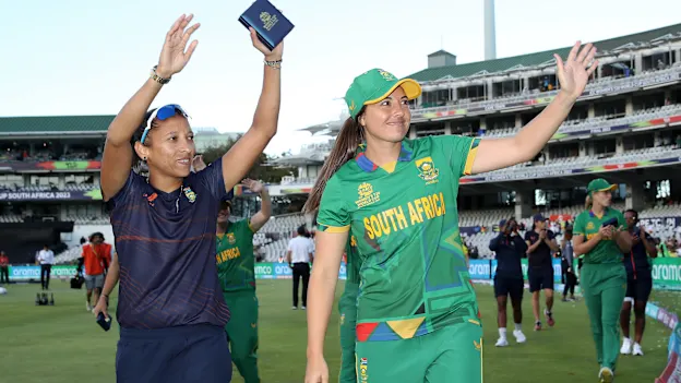 Shabnim Ismail and Sune Luus of South Africa interacts with the crowd following the ICC Women's T20 World Cup Final match between Australia and South Africa at Newlands Stadium on February 26, 2023 in Cape Town, South Africa.