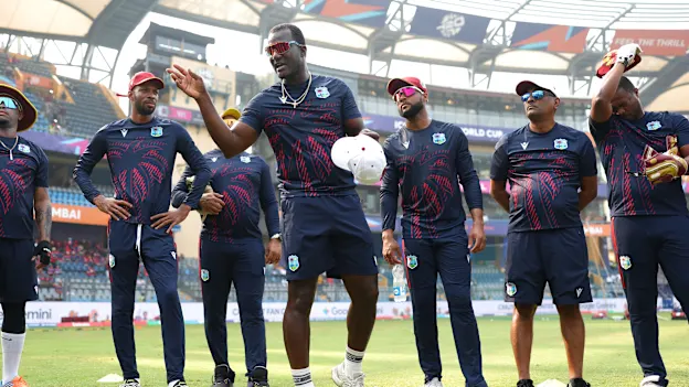 Darren Sammy, Head Coach of West Indies, leads a team talk as the players form a huddle prior to the ICC Men's T20 World Cup India & Sri Lanka 2026 match between West Indies and Nepal at Wankhede Stadium on February 15, 2026 in Mumbai, India