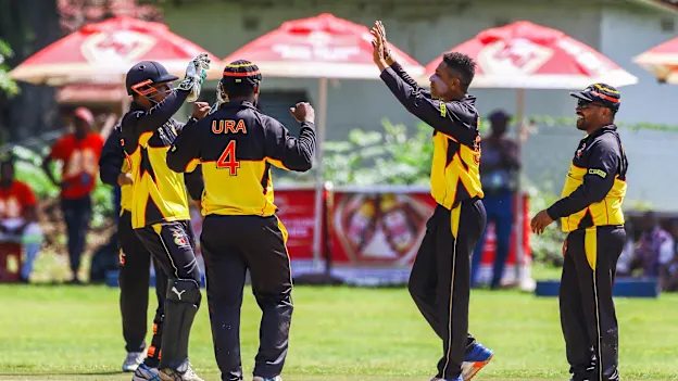 PNG bowler CJ Charles Amini celebratesa a wicket with his team mates during a play off match between Hong Kong and Papua New Guinea in the World Cup Quailfiers played at Old Hararians, March 17 2017 (©ICC).