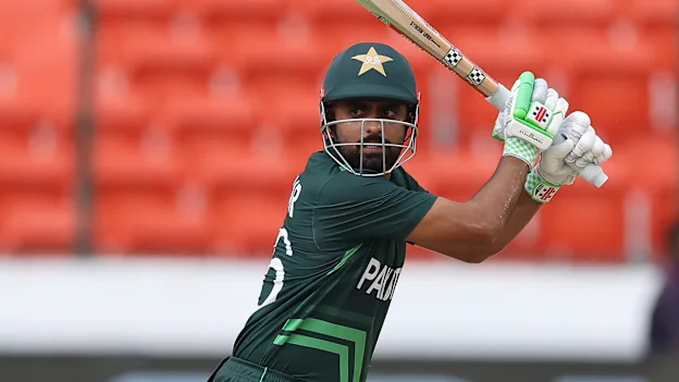 Babar Azam of Pakistan hits the ball towards the boundary during the ICC Men's Cricket World Cup India 2023 warm up match between New Zealand and Pakistan