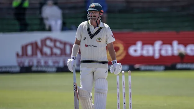 Travis Head walks back to the pavilion after being bowled by South Africa's Wiaan Mulder on day five of the second Test match between South Africa and Australia at St Georges Park in Gqeberha on October 22, 2026