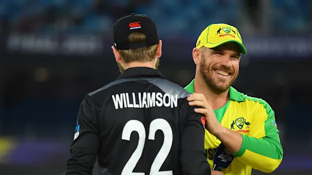 Kane Williamson of New Zealand interacts with Aaron Finch of Australia during the ICC Men's T20 World Cup final match between New Zealand and Australia