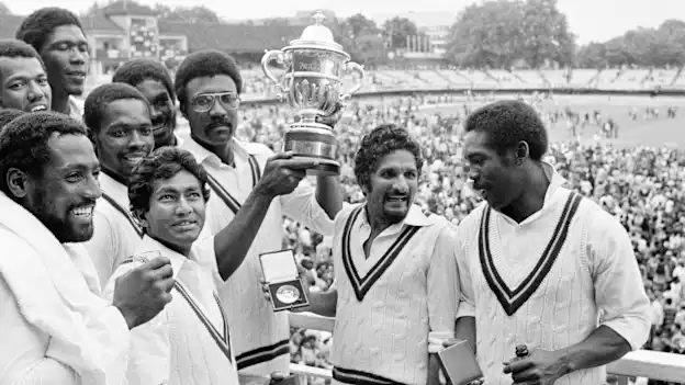 West Indies captain Clive Lloyd holds aloft the World Cup trophy after victory in the final over England in 1979