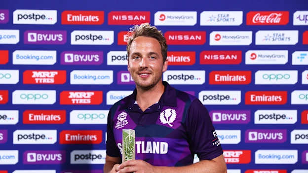 Josh Davey of Scotland poses after being named Player of the Match following the ICC Men's T20 World Cup match between Bangladesh and PNG at Oman Cricket Academy Ground on October 21, 2021 in Muscat, Oman.