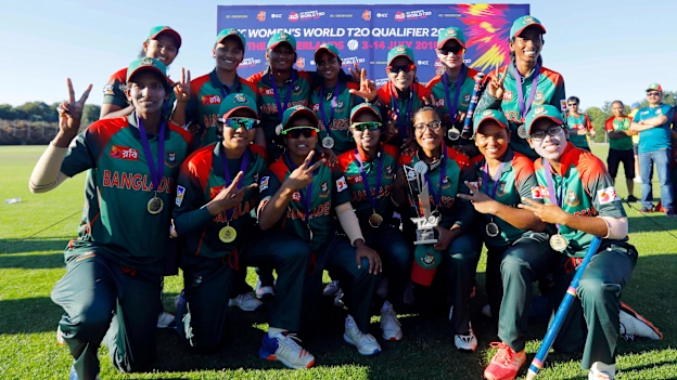 Bangladesh capt Salma Khatun with teammates poses with the trophy as the Bangladesh Team qualifies for T20 World Cup, Final, ICC Women's World Twenty20 Qualifier at Utrecht, Jul 14th 2018.
