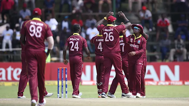 Windies players celebrate the wicket of Michael Jones of Scotland during The ICC Cricket World Cup Qualifier between The Windies and Scotland at The Harare Sports Club on March 21, 2018 in Harare, Zimbabwe (©ICC).