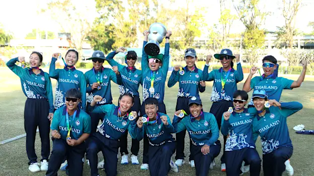 Team Thailand pose with the Women's Emerging Nations Trophy after winning the ICC Women's Emerging Nations Trophy 2025 match between Thailand and Scotland at Asian Institute of Technology on November 30, 2025 in Bangkok, Thailand