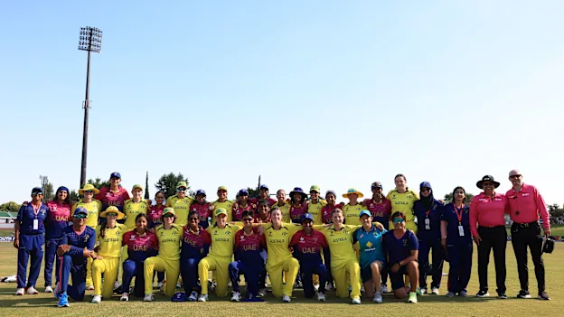 Players and Staff of Australia and UAE pose for a photo alongside the Match Officials following the ICC Women's U19 T20 World Cup 2023 Super 6 match between UAE and Australia at JB Marks Oval on January 23, 2023.